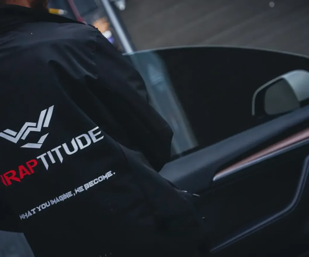 wraptitude employee working on window tinting